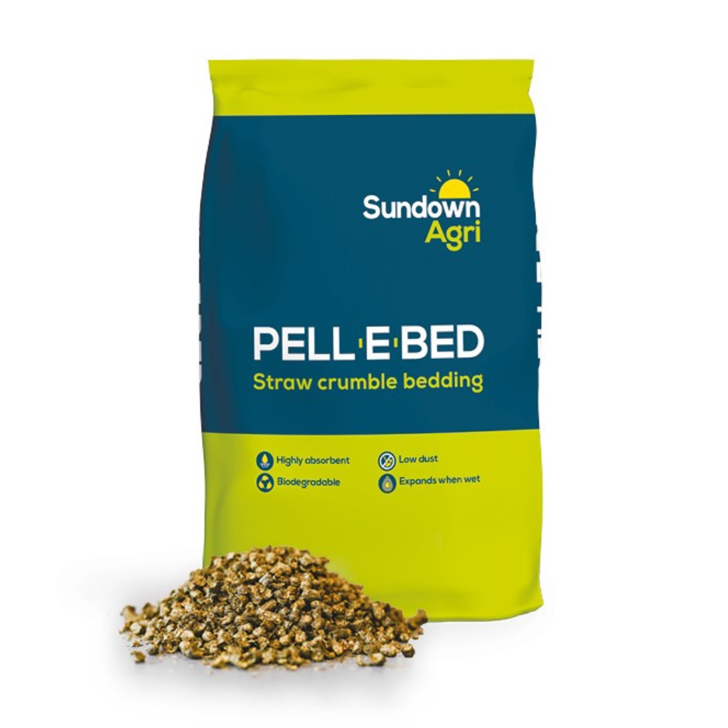 A bag of Pellebed with a pile of pellets