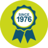 rosette icon with text 'since 1976'